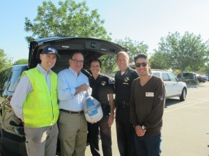 Suburban Water Systems’ Craig Gott (left) with Senator Bob Huff and Charity Volunteers at Suburban’s Operation Gobble Event.