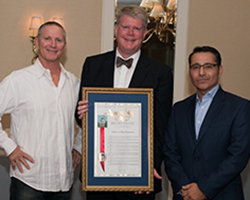 Outgoing CWA President Greg Milleman and 2017-18 CWA President Lawrence Morales Accepting the California Assembly Resolution from Assembly Member Mark Stone (D-Santa Cruz) Honoring CWA on its 75th Anniversary