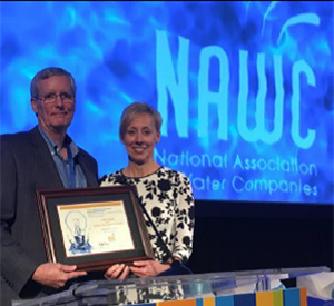 Robert Sprowls, Golden State Water President and CEO, accepting the NAWC Management Innovation Award, along with Denise Kruger, Golden State Water Senior Vice President of Regulated Utilities